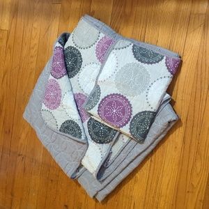 Reversible gray and purple design twin quilt and pillowcase